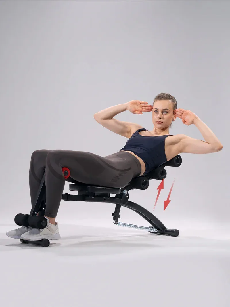 Adjustable Ab Machine and Sit-Up Bench in use for sit-ups — side view showing back rollers and rebound spring assist